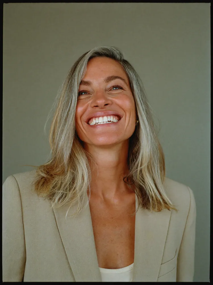 Woman smiling showcasing implants available at Ora dental